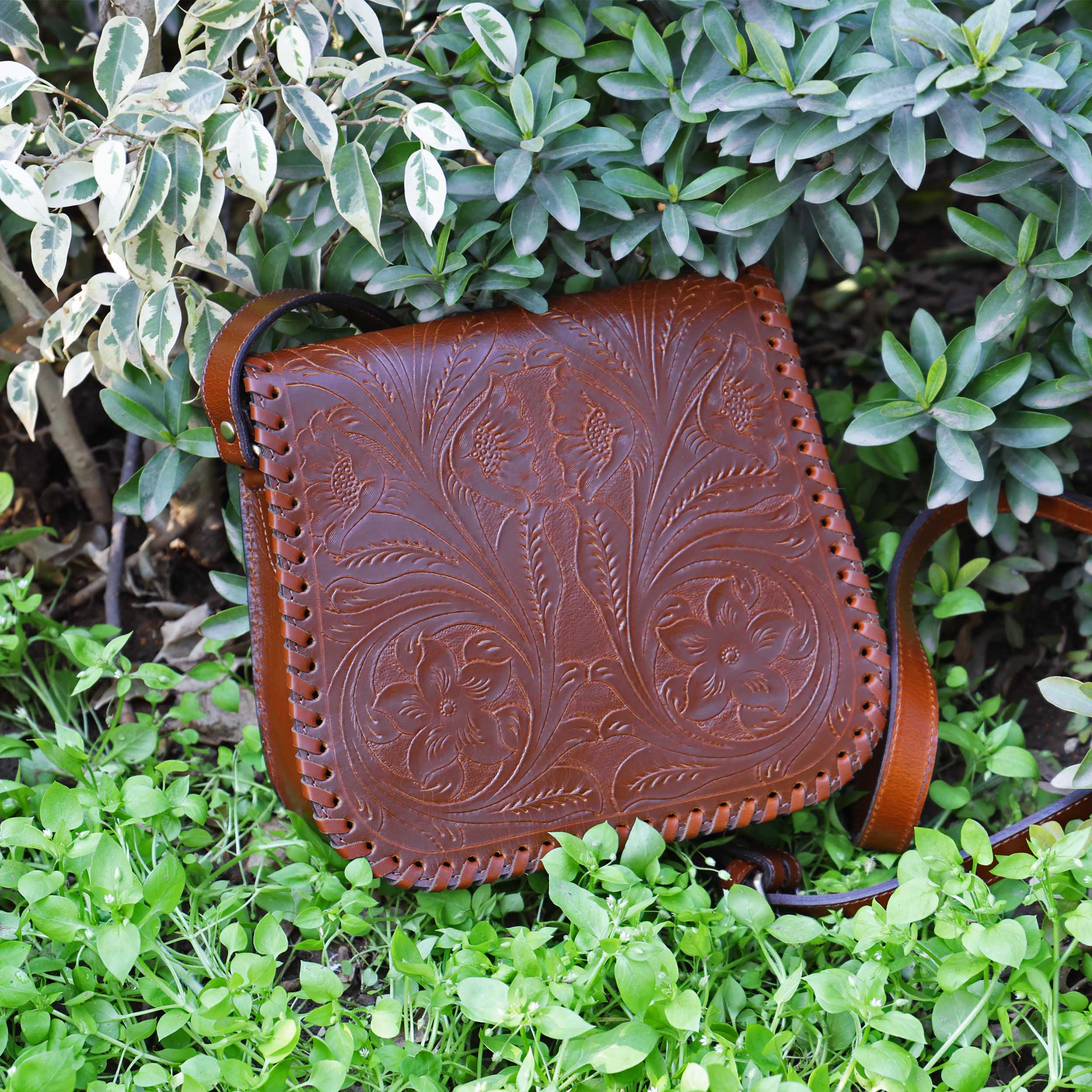 Handcrafted Black Embossed Leather Sling Bag with Magnetic Closure & Adjustable Strap