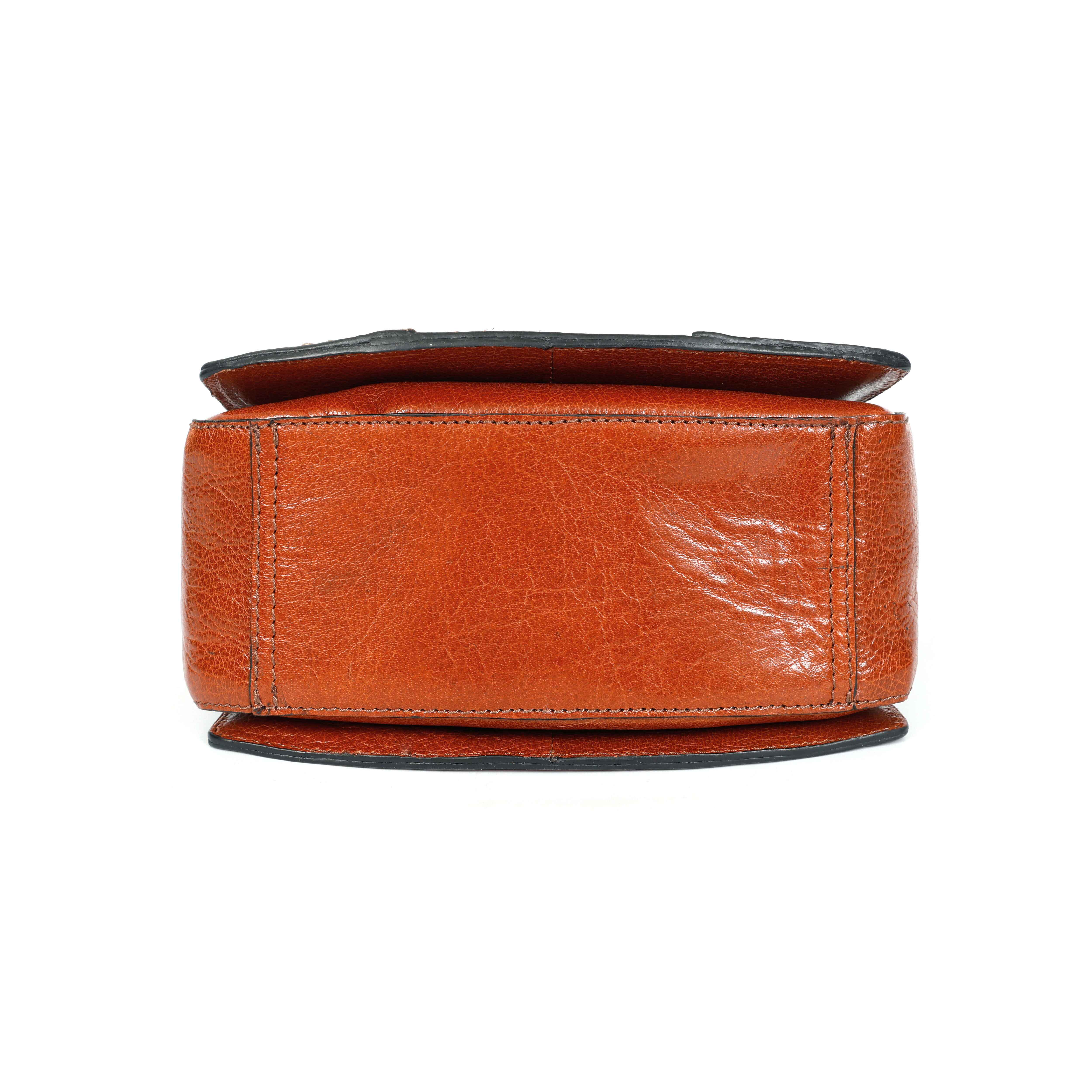 Premium Genuine Leather Handbag with Adjustable Strap & Stud Detailing