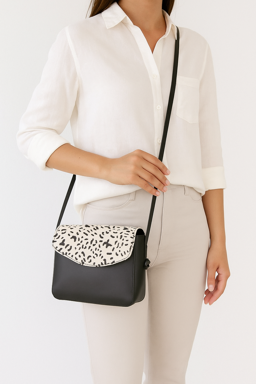 Elegance and Versatility Combined Black Leather Sling Bag with Printed Hair-On. Art: BG-1449