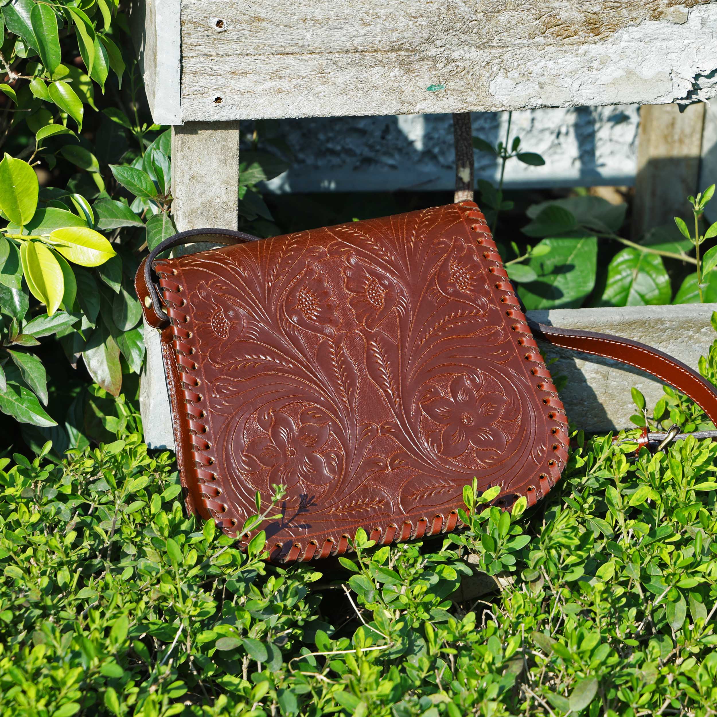 Handcrafted Black Embossed Leather Sling Bag with Magnetic Closure & Adjustable Strap