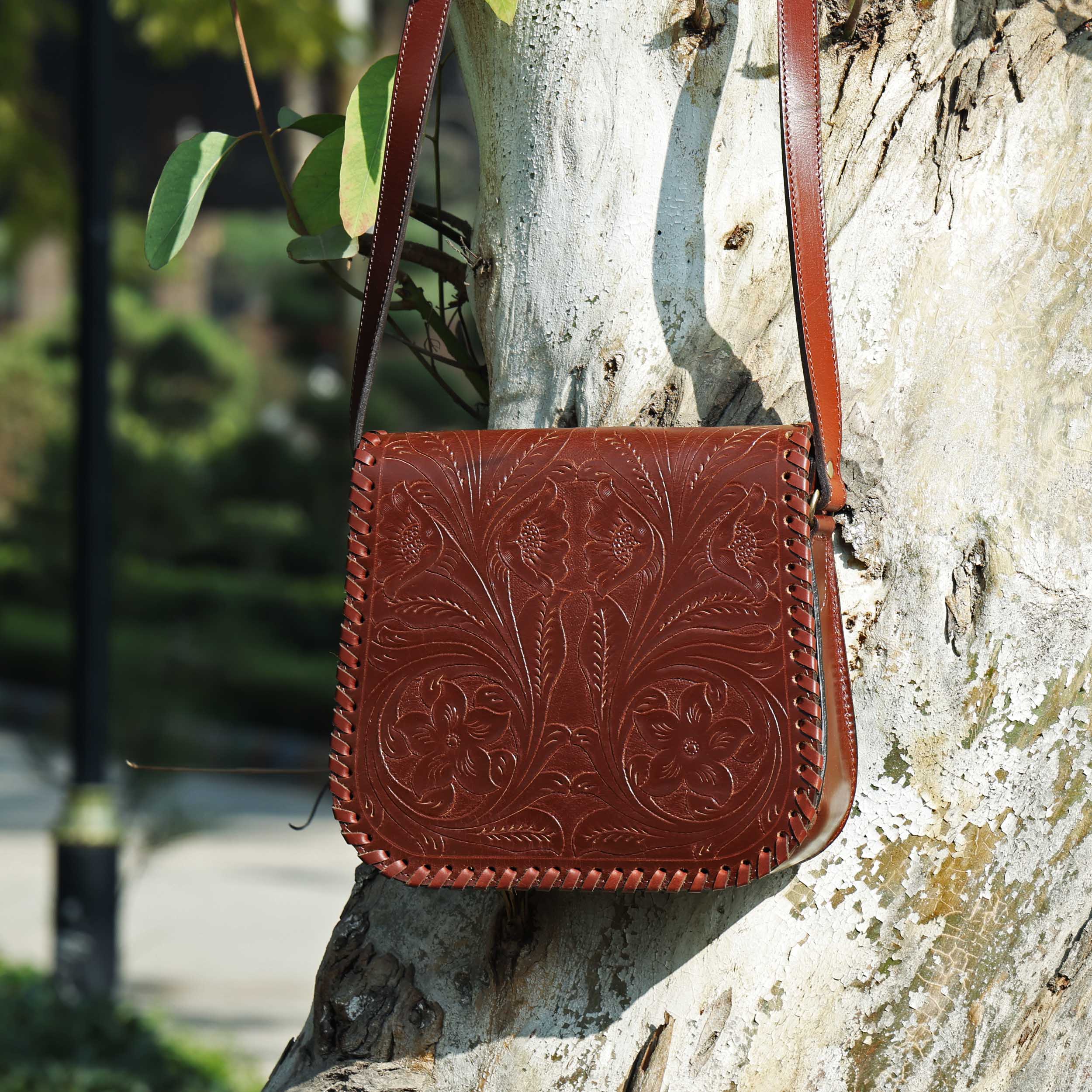 Handcrafted Black Embossed Leather Sling Bag with Magnetic Closure & Adjustable Strap