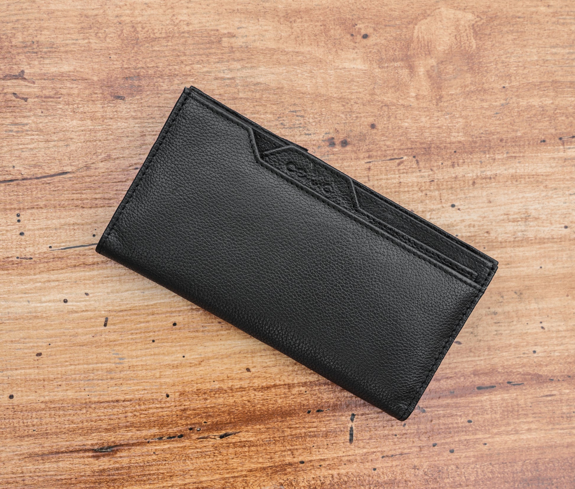 Timeless Elegance: Black Leather Clutch for Effortless Style. - CELTICINDIA