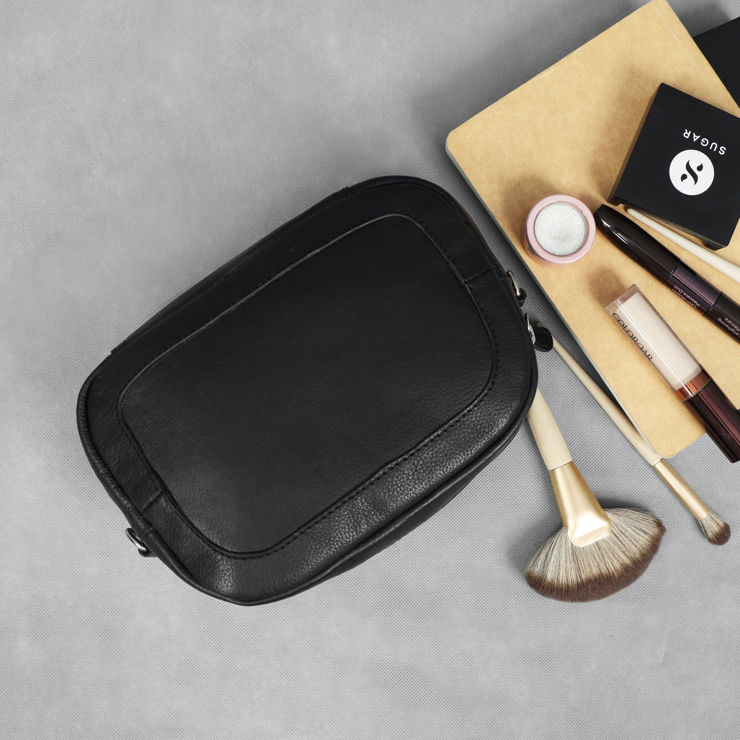 Premium Black Leather Compact Crossbody Bag with Adjustable Strap & Zip Compartments