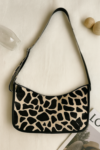 Elevate Your Style with our Black Leather Sling Bag featuring Printed Hair-On Design.  Art: BG-1361